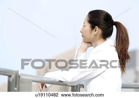 Stock Image - Business lady who rests. Fotosearch