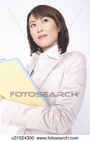 Business lady with a clipboard View Large Photo Image Stock Image - Business lady with a clipboard. Fotosearch