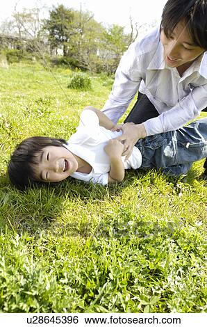 Stock Photograph - Father and child. Fotosearch