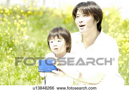 Stock Photograph - Father and son. Fotosearch