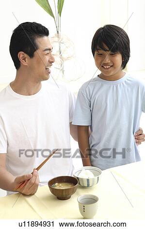 Father and the child of the smile View Large Photo Image Stock Image - Father and the child of the smile. Fotosearch