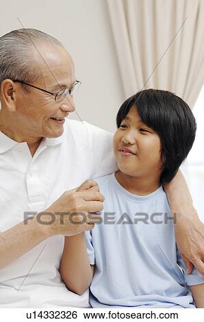 Stock Photograph - Grandad and grandchild. Fotosearch
