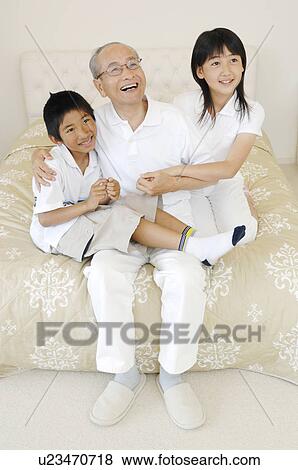 Grandad and grandchildren View Large Photo Image Stock Photo - Grandad and grandchildren. Fotosearch