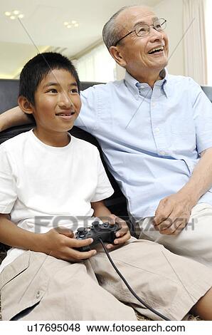 Grandfather and grandchild View Large Photo Image Stock Photo - Grandfather and grandchild. Fotosearch