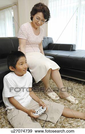 Grandma and grandchild View Large Photo Image Stock Photo - Grandma and grandchild. Fotosearch