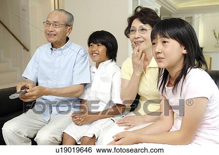 Stock Photograph - Happy circle with grandchild. Fotosearch