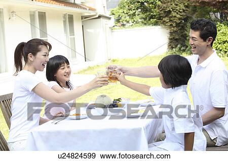 Parent and child eating a meal View Large Photo Image Stock Photo - Parent and child eating a meal. Fotosearch