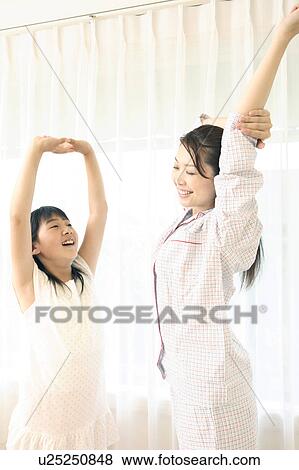Parent and child who stretch themselves View Large Photo Image Stock Photo - Parent and child who stretch themselves. Fotosearch