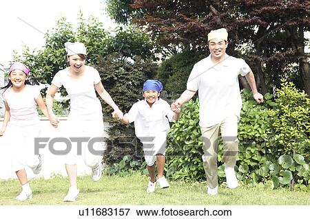 Parents and children playing outside View Large Photo Image Stock Photo - Parents and children playing outside. Fotosearch