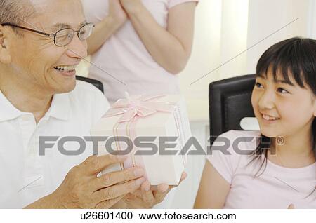 Present from grandchild View Large Photo Image Stock Image - Present from grandchild. Fotosearch