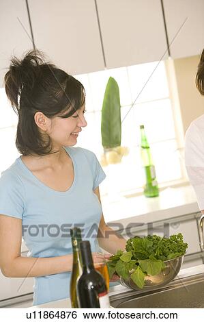 Scene of woman cooking View Large Photo Image Stock Photograph - Scene of woman cooking. Fotosearch