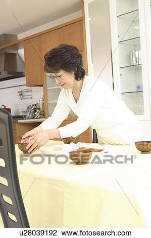Woman putting miso soup View Large Photo Image Stock Image - Woman putting miso soup. Fotosearch