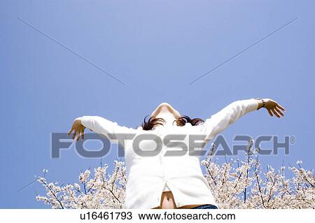 Sky and woman View Large Photo Image Stock Image - Sky and woman. Fotosearch