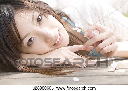 Stock Photography - Woman in the spring. Fotosearch