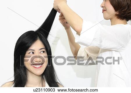Woman who cuts hair View Large Photo Image Stock Image - Woman who cuts hair. Fotosearch