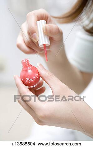 Woman who paints with manicure View Large Photo Image Picture - Woman who paints with manicure. Fotosearch