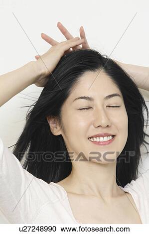 Stock Image - Woman's portrait. Fotosearch
