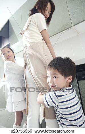 Stock Photograph - Children in the kitchen. Fotosearch