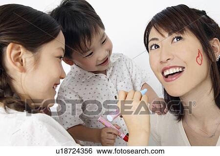 Stock Photograph - Face painting. Fotosearch