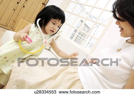Mother and daughter View Large Photo Image Stock Image - Mother and daughter. Fotosearch