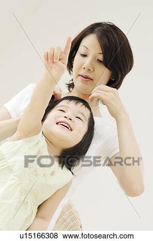 Stock Photo - Mother and daughter. Fotosearch