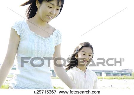 Stock Photo - Mother and daughter. Fotosearch