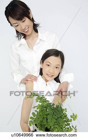 Mother and daughter View Large Photo Image Stock Photograph - Mother and daughter. Fotosearch