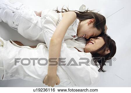 Stock Photograph - Mother and daughter. Fotosearch