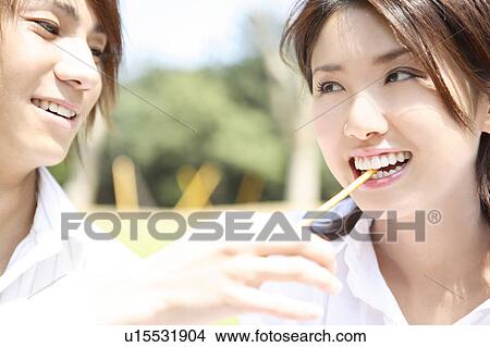 Couple having a date View Large Photo Image Picture - Couple having a date. Fotosearch