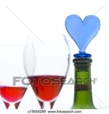 Glasses of red wine and wine bottle View Large Photo Image Stock Photo - Glasses of red wine and wine bottle. Fotosearch