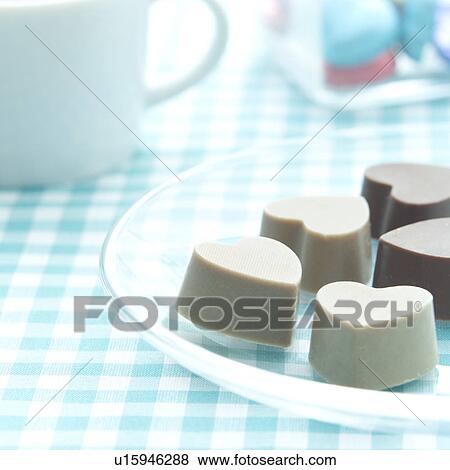 Heart-shaped chocolates View Large Photo Image Stock Photo - Heart-shaped chocolates. Fotosearch