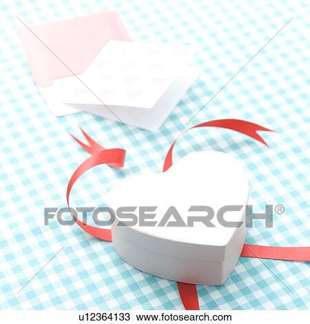 Heart-shaped gift box with greeting card View Large Photo Image Stock Image - Heart-shaped gift box with greeting card. Fotosearch