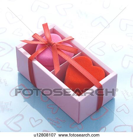 Stock Photo - Heart-shaped objects in box. Fotosearch