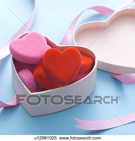Stock Photography - Heart-shaped objects in box. Fotosearch