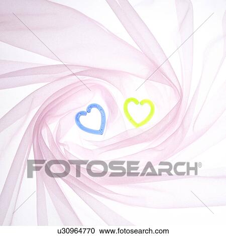 Stock Image - Little heart-shaped objects. Fotosearch