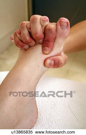 Stock Photography - Foot massage. Fotosearch