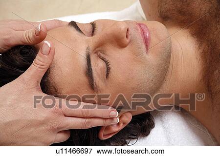 Man having facial massage View Large Photo Image Stock Photo - Man having facial massage. Fotosearch