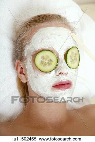 Woman having a facial treatment in a spa View Large Photo Image Stock Photography - Woman having a facial treatment in a spa. Fotosearch