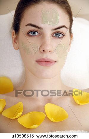 Woman having a facial treatment in a spa View Large Photo Image Stock Photography - Woman having a facial treatment in a spa. Fotosearch