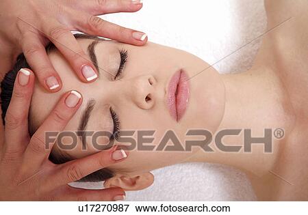 Woman having facial massage View Large Photo Image Stock Photo - Woman having facial massage. Fotosearch