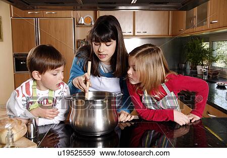 Stock Photo - Children cooking. Fotosearch