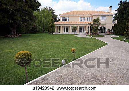 Exterior view of modern house View Large Photo Image Stock Image - Exterior view of modern house. Fotosearch