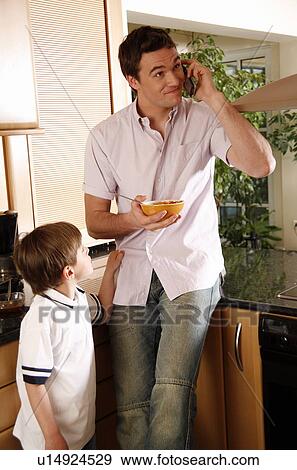 Man eating his breakfast View Large Photo Image Stock Photo - Man eating his breakfast. Fotosearch