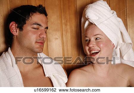 A couple enjoying a sauna together View Large Photo Image Stock Image - A couple enjoying a sauna together. Fotosearch