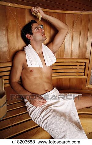 Stock Photo - A man enjoying a sauna. Fotosearch