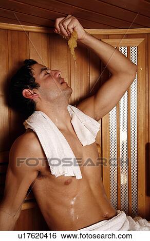 Stock Photograph - A man enjoying a sauna. Fotosearch