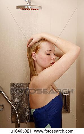 Woman taking a shower at the gym View Large Photo Image Stock Image - Woman taking a shower at the gym. Fotosearch