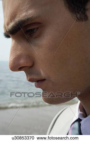 Businessman on the beach View Large Photo Image Stock Image - Businessman on the beach. Fotosearch