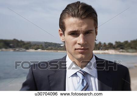 Businessman on the beach View Large Photo Image Stock Photograph - Businessman on the beach. Fotosearch
