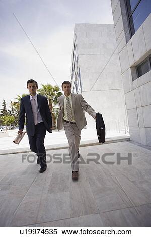 Businessmen running View Large Photo Image Stock Photography - Businessmen running. Fotosearch